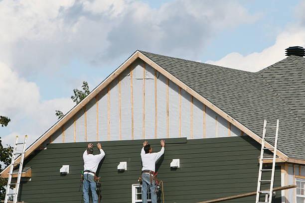 Professional Siding technician working in Savage, MD